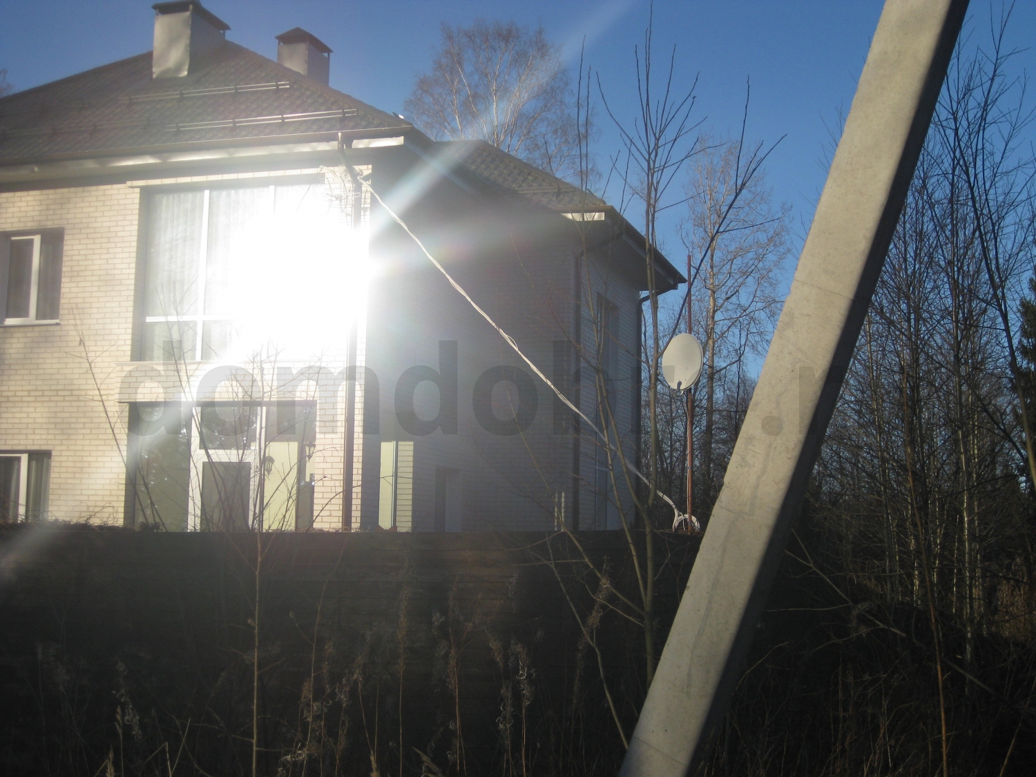 Частный двухэтажный дом из клинкерной фасадной плитки