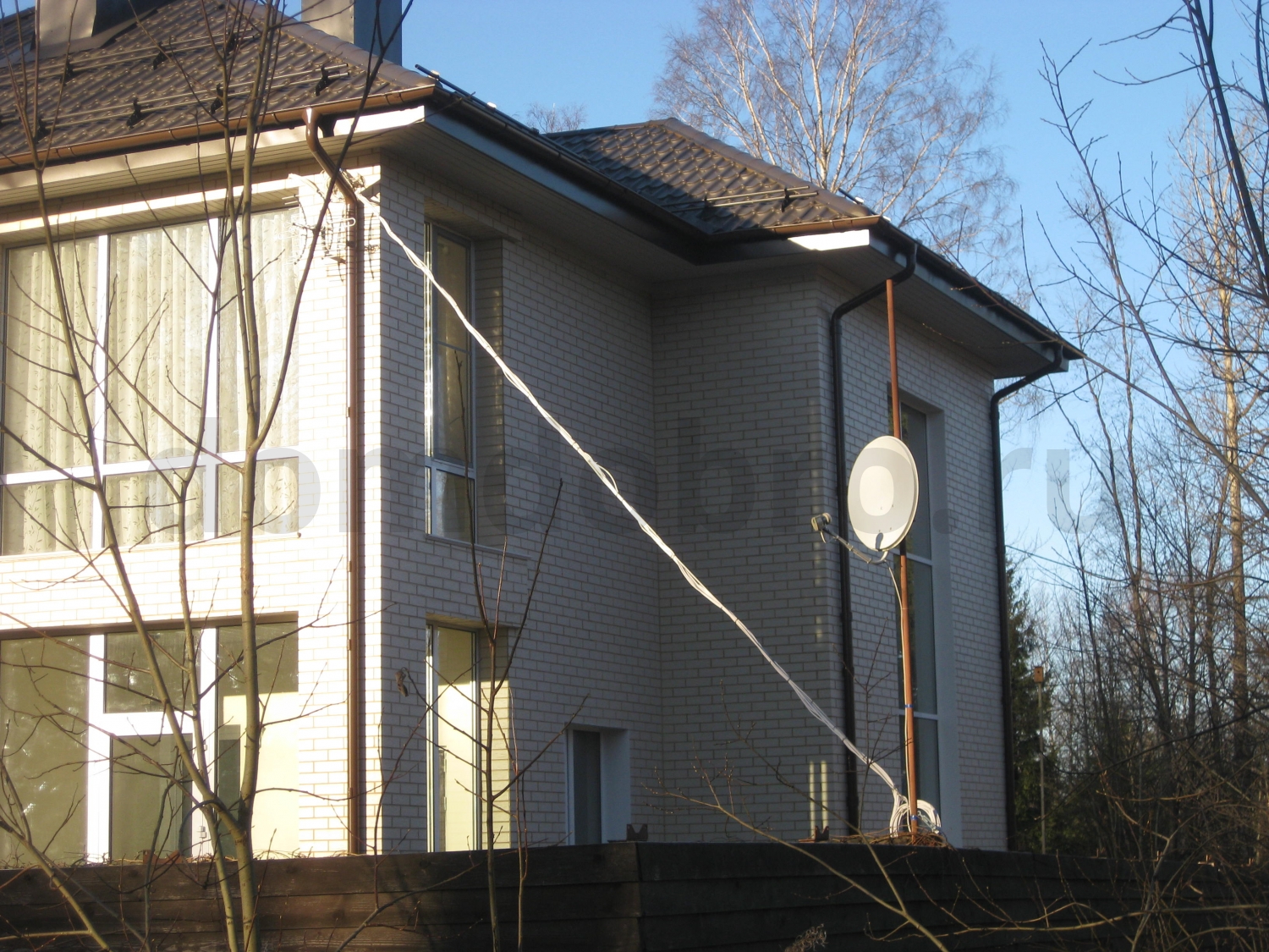 Частный двухэтажный дом из клинкерной фасадной плитки