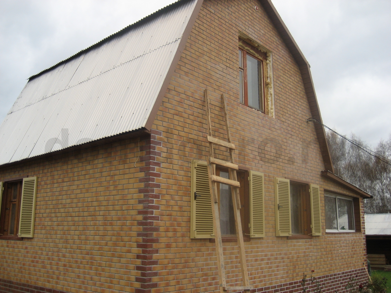 Фото дома с двумя видами клинкерной плитки