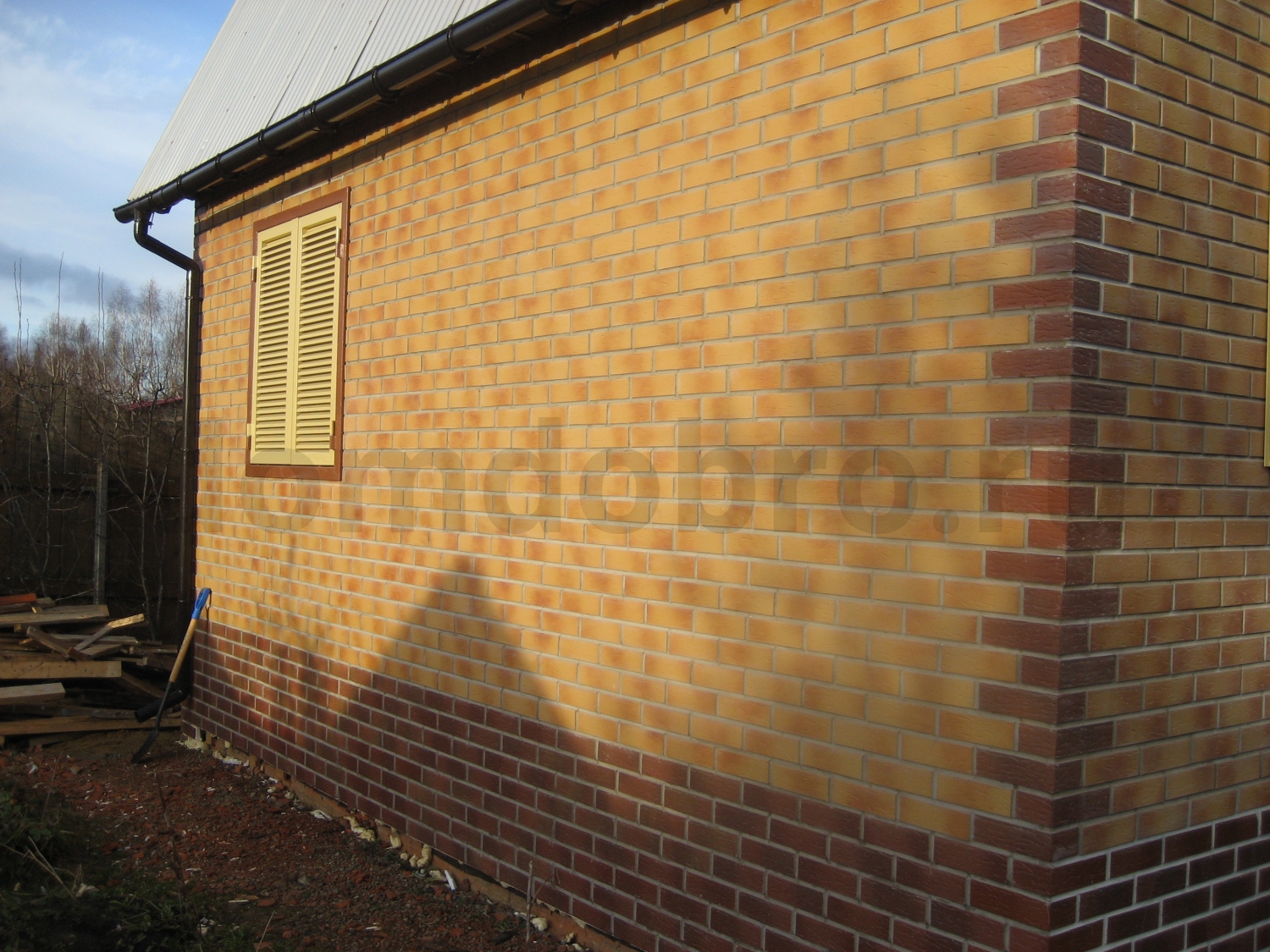 Фото дома с двумя видами клинкерной плитки