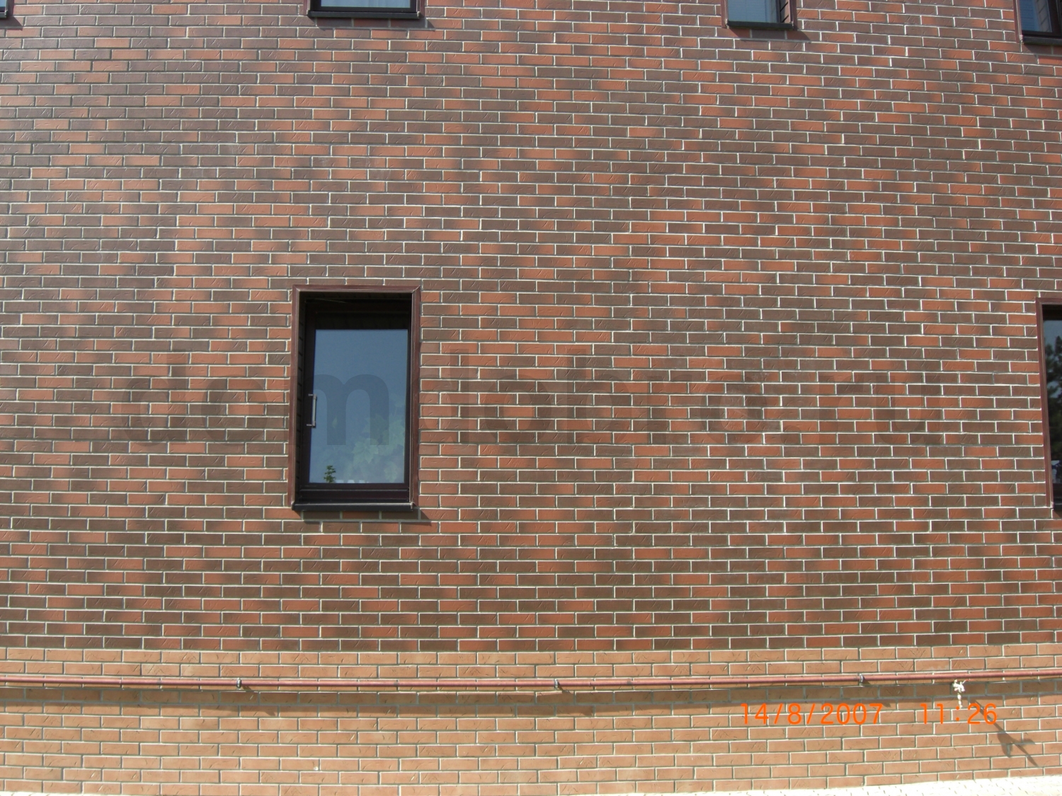 Облицовка четырехэтажного дома клинкерной фасадной плиткой  в Сальково